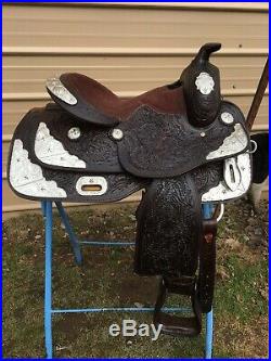 15 Seven Oaks western show saddle withsilver, tooled dark oil leather