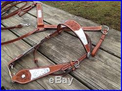 16.5 med oil Western show saddle withsilver, matching breast collar & bridle set