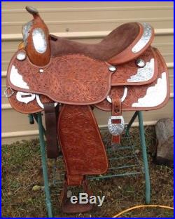 16.5 med oil Western show saddle withsilver, matching breast collar & bridle set