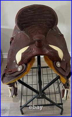 18 Seat Western Horse Saddle and Stand. Valued @ $1200.00 Asking $600.00