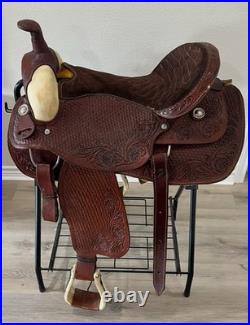 18 Seat Western Horse Saddle and Stand. Valued @ $1200.00 Asking $600.00