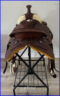 18 Seat Western Horse Saddle and Stand. Valued @ $1200.00 Asking $600.00