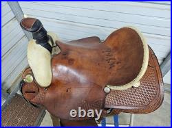 A Used 16 Dakota Saddlery Brown Color Hard Tail Slick Seat Roping Saddle