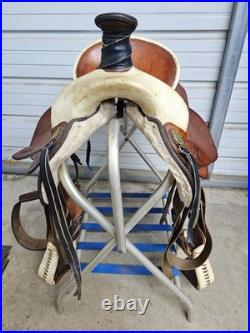A Used 16 Dakota Saddlery Brown Color Hard Tail Slick Seat Roping Saddle