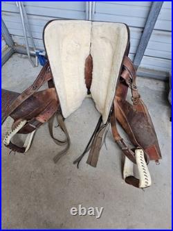 A Used 16 Dakota Saddlery Brown Color Hard Tail Slick Seat Roping Saddle