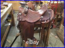 Custom made wade saddle by granite station saddlery full tooled