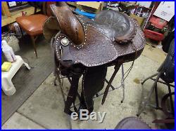 Nice Used 16 Seat Simco with buckstitching and fully tooled leather saddle