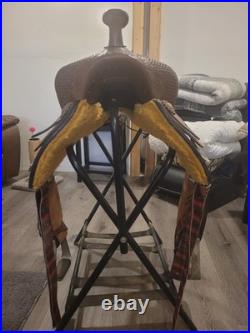 Super comfy leather Western trail saddle with stirrups included. Only ridden 3x