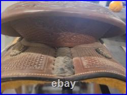 Super comfy leather Western trail saddle with stirrups included. Only ridden 3x