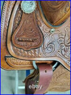 Used 15.5 Herford Tex Tan Brown Leather Roping saddle with Tooling All over It
