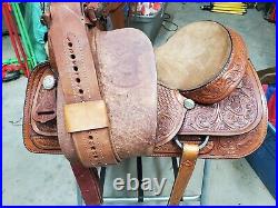 Used 15.5 Herford Tex Tan Brown Leather Roping saddle with Tooling All over It
