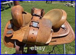 Used 15 Big Horn tooled Western all-around saddle withsemi bars US made