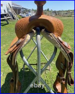 Used 15 Big Horn tooled Western all-around saddle withsemi bars US made