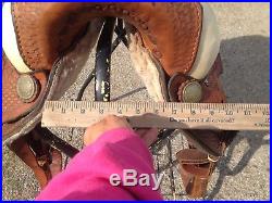 Used 16 Western pleasure /trail saddle basket stamped leather semi bars