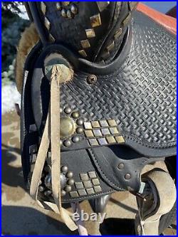 Used/vintage 15.5 black leather Western parade saddle withtapaderos, silver