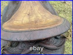 Used /vintage 15 tooled round skirt Western saddle for round withers US made