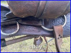 Used /vintage 15 tooled round skirt Western saddle for round withers US made
