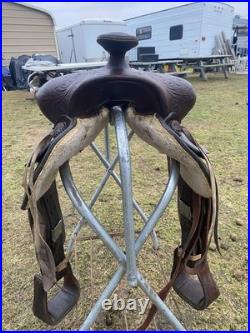 Used /vintage 15 tooled round skirt Western saddle for round withers US made