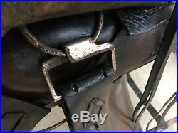Used/vintage/antique hard seat Western saddle withfree swinging fenders US made